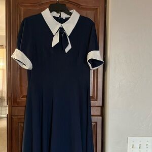 Elegant Navy Blue Dress with White Accents